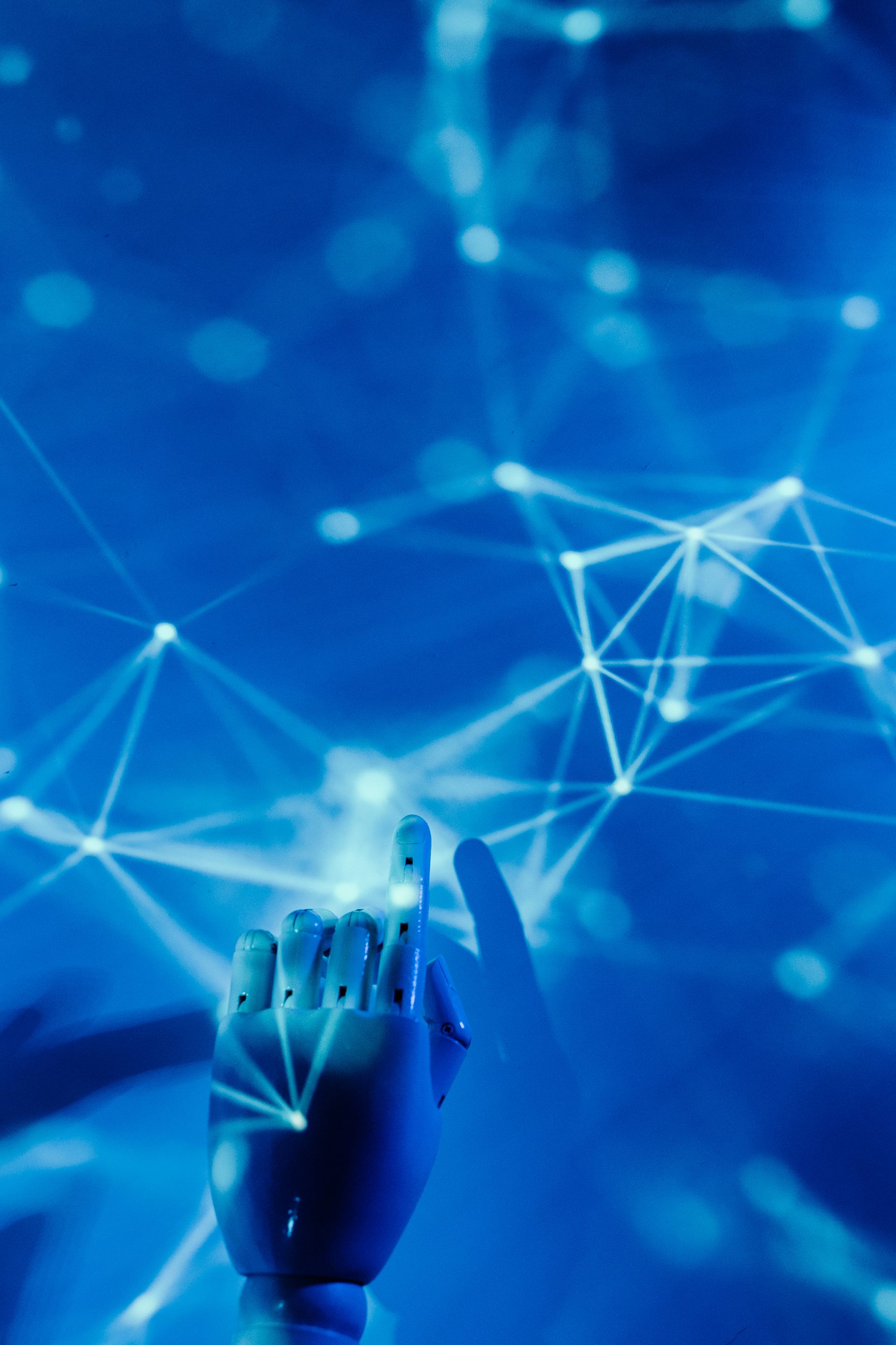a blue digital web with a figure pointing